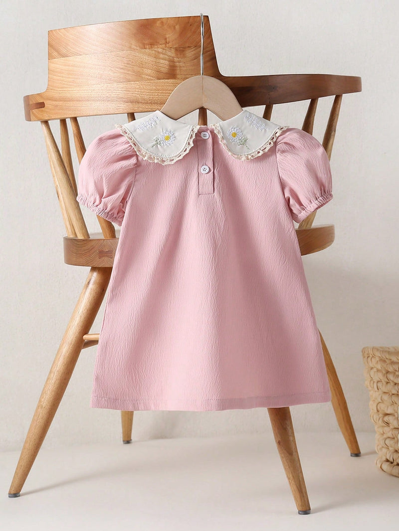 Vestido Bebê Rosa com Margaridas