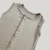 Macacão Bebê Confort Bege