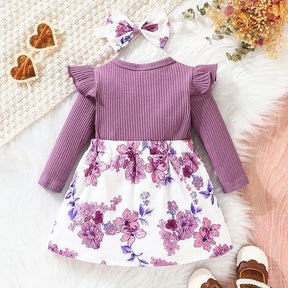 Vestido Jardineira Flores e Lacinho