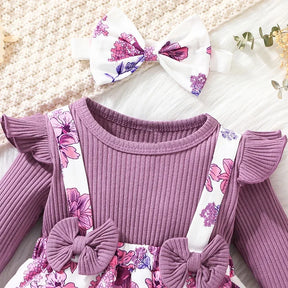 Vestido Jardineira Flores e Lacinho